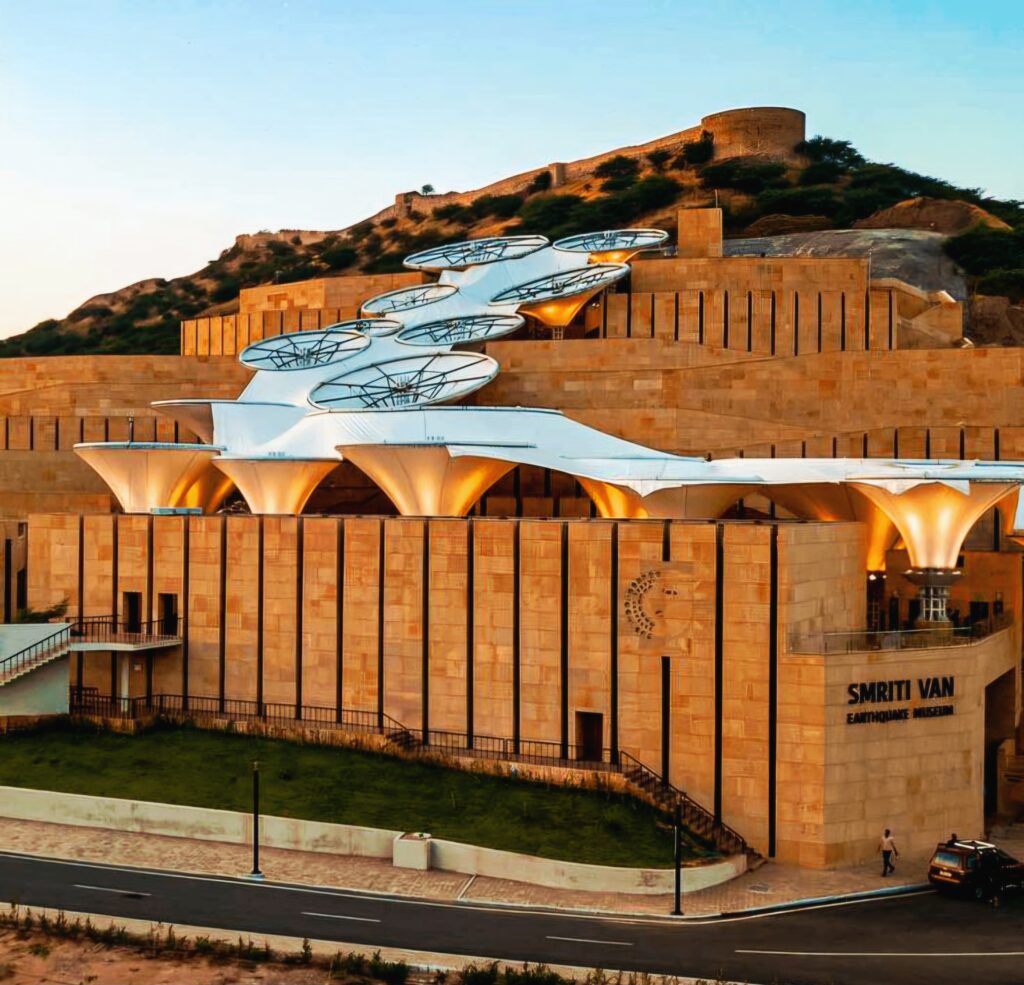 Smritivan Earthquake Memorial and Museum in Bhuj, Kutch, showcasing landscaped hills, tribute walls, and panoramic city views.
