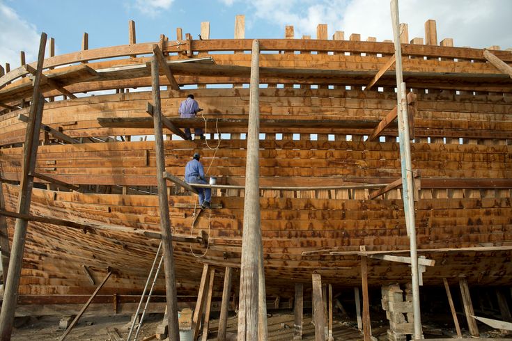 Traditional wooden shipbuilding yard in Mandvi, Kutch, showcasing centuries-old maritime craftsmanship.